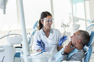 Dentist explaining treatment to patient