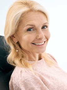 Woman smiling in the dental chair