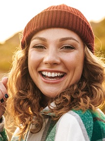 Woman smiling outside