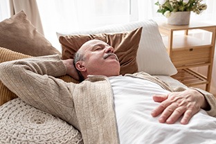 Man resting on a couch